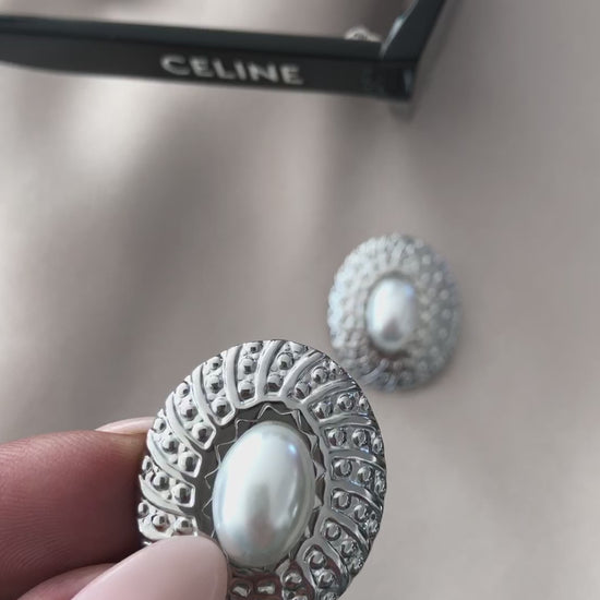 The vintage earrings in silver